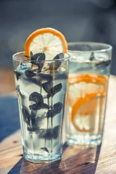Lemonade in a glass on the table Stock Photos
