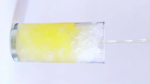 Lemonade with ice and grapefruit slice. Orange juice with ice Stock Footage 235813339