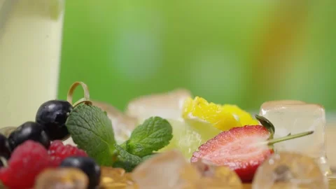 Lemonade Ingredients on Table Outside Green Blurry Background Nature  Vídeo Stock 153209659