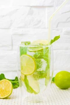 Lemonade with lime mint on a light background Foto stock
