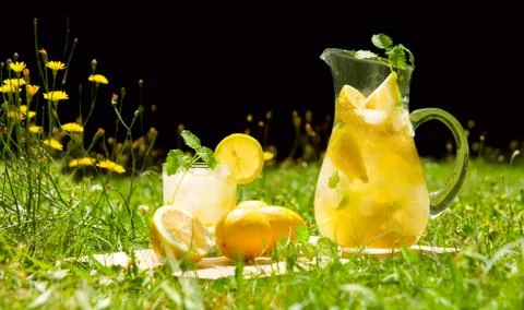 Lemonade in meadow Stock Photos