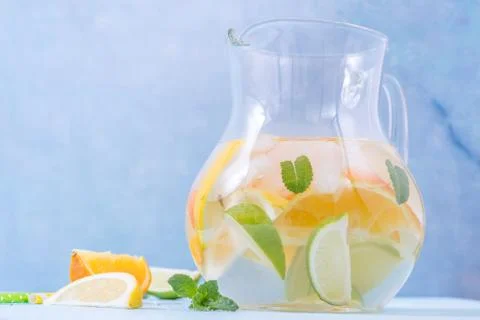 Lemonade pitcher with lemon, orange, lime slices 스톡 사진