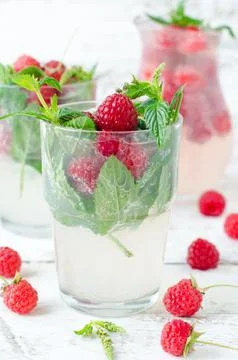 Lemonade with raspberry and mint Stock Photos