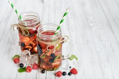 Lemonade with summer berries Stock Photos