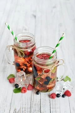 Lemonade with summer berries Stock Photos