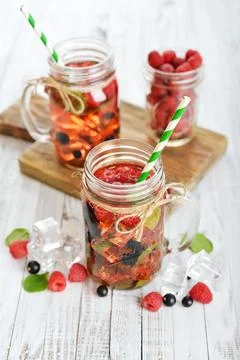 Lemonade with summer berries Stock Photos