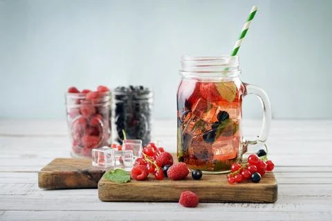 Lemonade with summer berries Stock Photos