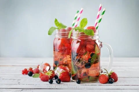 Lemonade with summer berries Stock Photos