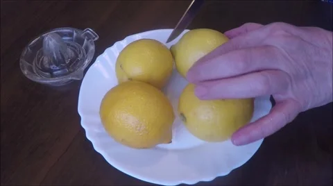 Lemons and juicer group Stock Footage 46046424