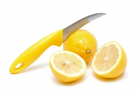 Lemons and Knife Stock Photos