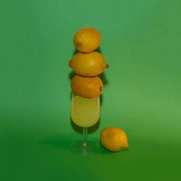 Lemons and lemonade creative concept studio shot.  Stock Photos