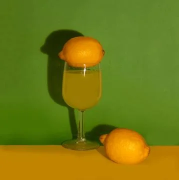 Lemons and lemonade creative concept studio shot.  Stock Photos