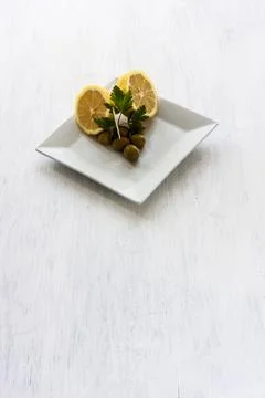 Lemons and olives Stock Photos