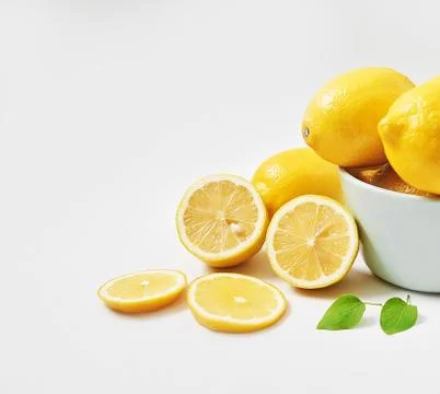 Lemons background. Group of lemons with leaves on white background. Citruses  Stock Photos
