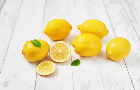 Lemons background. Group of lemons with leaves on white background. Citruses  Stock Photos