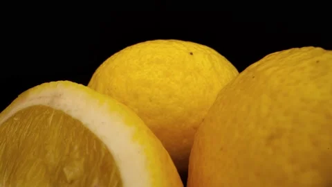 Lemons On Black Background Camera Rolling In Stock Footage 131800318