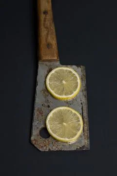 Lemons on a black background. Citrus fruit. Healthy food. Stock Photos