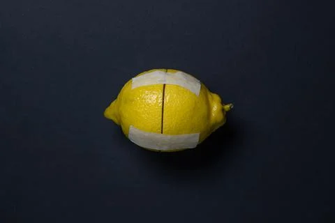 Lemons on a black background. Citrus fruit. Healthy food.  Stock Photos