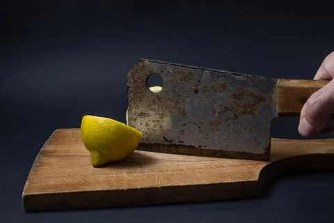 Lemons on a black background. Citrus fruit. Healthy food. Stock Photos
