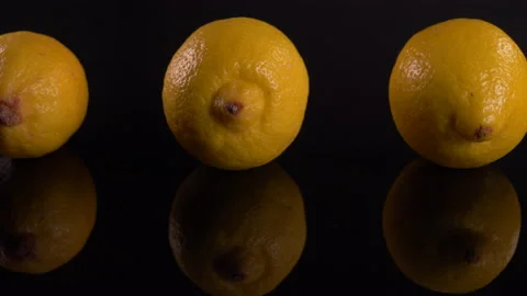 Lemons on Black Background Panning Video stock 131000830