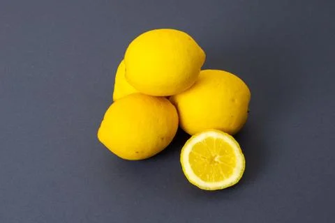 Lemons on dark blue background Stock Photos