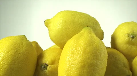 Lemons isolated rotating on white background Stock Footage 62393949