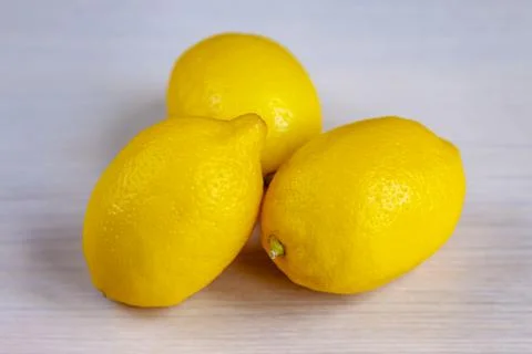 Lemons lie on a table Stock Photos
