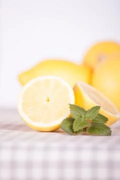 Lemons with mint in pieces Stock Photos