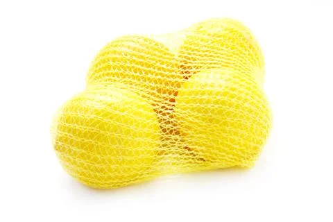 Lemons In A Net Stock Photos