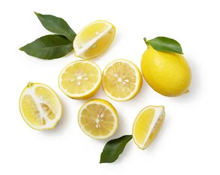 Lemons placed on a white background with copy space and cut in half Stock Photos