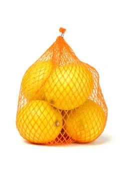 Lemons in plastic netting Stock Photos