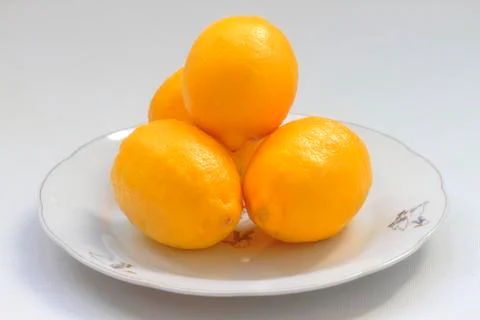 Lemons on a plate Stock Photos