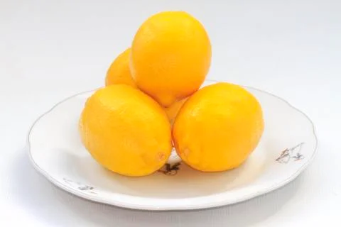 Lemons on a plate Stock Photos