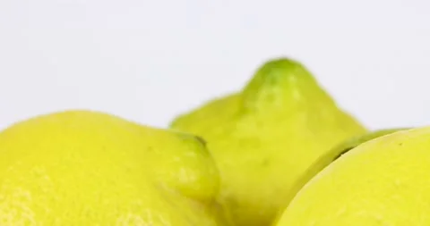 Lemons rotating on white background Stock Footage 146442630