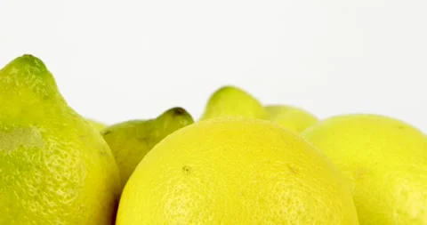 Lemons rotating on white background Stock Footage 146442666