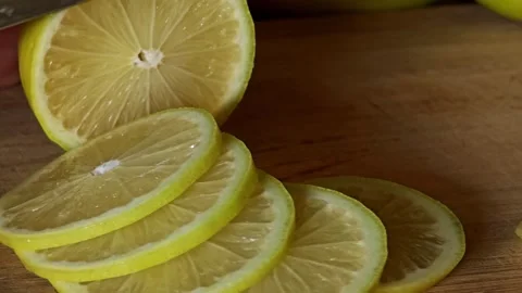 Lemons sliced on cutting board. Stock Footage 309023031