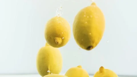 Lemons in water. Lots of lemons. Stock Footage 142314716