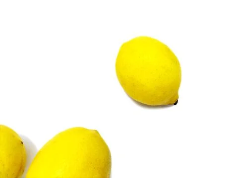 Lemons on white paper background Stock Photos
