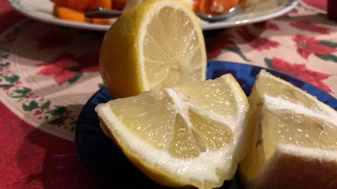 Lemons in a white plate Stock Footage 122077901