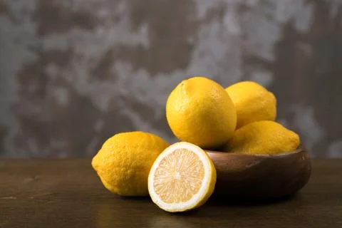 Lemons on a wooden table Foto stock