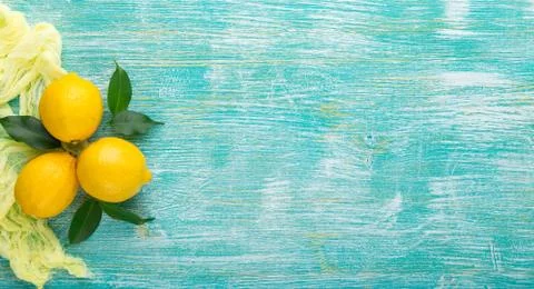 Lemons on wooden table Stock Photos