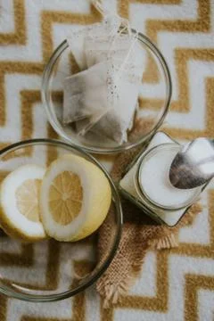 Lemon,sugar and tea at the table Foto stock