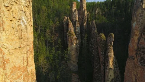 Lena pillars sharp cliffs moss covered peaks Russia Siberia unique sight Aerial  Video stock 121177522