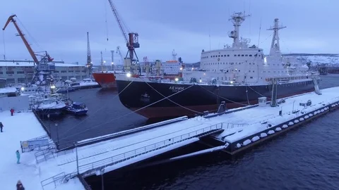 Lenin nuclear powered icebreaker ship. Murmansk port bay Aerial drift 4k  Stock Footage 74646565