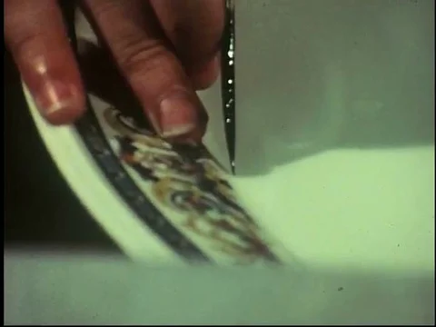 Lenox's china temper-ware patterns are precisely applied by master artisans inƒ Stock Footage 75298635