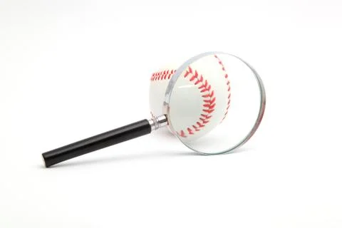 Lens and a baseball Stock-Fotos