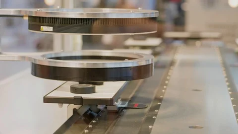 Lens of automatic test set scanning details on conveyor Stock Footage 105597129