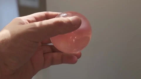 Lens ball macro slow motion Stock Footage 203839191