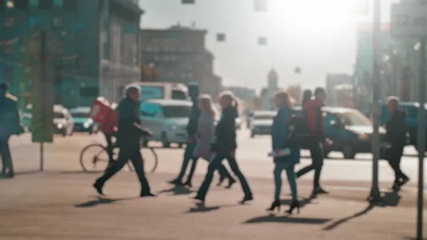 Lens blur, out of focus. A crowd of people is walking along the pedestrian Stock Footage 143607479