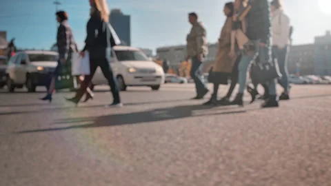 Lens blur, out of focus. A crowd of pedestrians is walking along the street Video stock 143732633